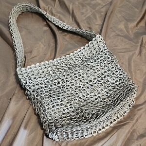 Silver Metallic Shoulder Bag with Artistic Design